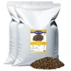 Two large white bags of bird food with a label and a pile of the product in front. Produktbild-Vorschau