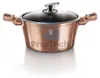 A rose gold pot with a glass lid and handles, set against a white background with a reflection. Podgląd zdjęcia produktu