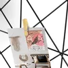 A collage of decorative items including a framed picture of a tiger, macrame wall hanging, and a woven necklace displayed on a table and bench. Voir les images du produit
