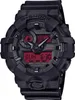 A close-up, front-facing studio shot of a black G-Shock digital watch with a red display. Voir les images du produit