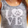 Close-up of a doll's gray tank top with a white 'LOVE' graphic and a paw print inside the 'O'. Podgląd zdjęcia produktu