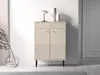 A beige cabinet with fluted doors and a drawer, placed against a white wall with a lamp and vases on top. A plant in a glass vase is on the left. Podgląd zdjęcia produktu