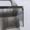 A close-up view of the interior corner of a stainless steel grill, showing the construction and some rivets. Náhled obrázku produktu
