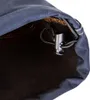 A close-up view of the interior of a garment, showing a drawstring and toggle mechanism. Produktbild-Vorschau