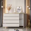 A modern dresser with drawers and an open cabinet, decorated with a bust, dried flowers, and a painting. Produktbild-Vorschau