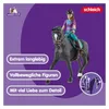 A toy horse and rider figure with descriptive text and logos on a purple background. Voir les images du produit
