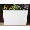 A white planter box filled with pansies and other flowers, placed on a patio or porch. Produktbild-Vorschau