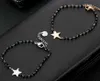 Bracelet en acier chirurgical avec perles noires Star Voir les images du produit 7