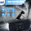 A black emergency weather radio is shown in the foreground against a dramatic background of a tornado and lightning, with icons representing different weather hazards surrounding it. Produktbild-Vorschau
