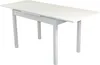 A white dining table with extendable leaves, shown from a three-quarter angle against a white background. Produktbild-Vorschau