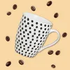 Set di 4 tazze da caffè con design a righe punteggiate Anteprima dell’immagine prodotto 4