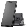 A dark gray flip case for a smartphone is shown standing upright, with the phone partially inserted. Náhľad obrázku produktu