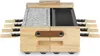 A raclette grill with a stone surface and a grill surface, made of natural wood. Voir les images du produit