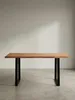 Frontansicht des Schreibtisches aus Akazie Massivholz, 160 cm breit, mit markanter Baumkante und stabilen, schwarzen Metall-Trapezbeinen auf weißem Hintergrund._#sku_SAFWL7.263# Produktbild-Vorschau
