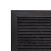 A close-up view of the corner of a black letter board with horizontal lines. Produktbild-Vorschau