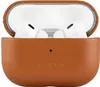 A pair of white AirPods Pro are shown inside an open brown leather case. Voir les images du produit