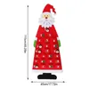 A Santa Claus shaped advent calendar with numbered pockets. Produktbild-Vorschau