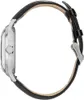 Side view of a watch with a black leather strap. Voir les images du produit