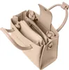 A top-down view of an open pink handbag. Podgląd zdjęcia produktu