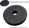 A close-up view of a black weight plate with embossed branding and weight information. Náhľad obrázku produktu
