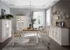 A dining room setting with a table, bench, chairs, and sideboards. Produktbild-Vorschau