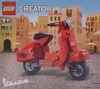 A LEGO Creator Expert 40517 Vespa set box, showing a red LEGO Vespa scooter in front of a backdrop of Italian-style buildings. Podgląd zdjęcia produktu