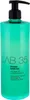 A teal shampoo bottle with a black pump dispenser against a white background. Anteprima dell’immagine prodotto