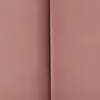 A close-up view of a pink fabric, possibly a cushion or upholstery, with a fold creating a shadow. Anteprima dell’immagine prodotto