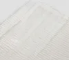 A close-up view of a textured beige fabric, likely a curtain or textile, showing different weave patterns and textures. Produktbild-Vorschau
