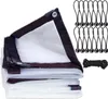 A folded transparent tarp with dark red trim and grommets, along with bungee cords and a rope, is displayed against a white background. Produktbild-Vorschau