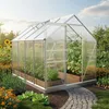 A greenhouse filled with plants, set in a garden with sunflowers and flowers. Produktbild-Vorschau