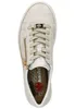 A top-down view of a beige sneaker with a gold zipper. Náhled obrázku produktu