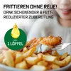 A person is about to eat fish and chips from a plate, with a graphic indicating minimal oil usage. Anteprima dell’immagine prodotto