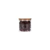 A glass jar filled with dark brown dried fruit, topped with a bamboo lid. Produktbild-Vorschau