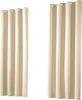 Two sets of cream-colored curtains hanging against a white background. Produktbild-Vorschau