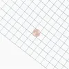 A single coin is placed on a grid pattern. Produktbild-Vorschau