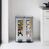 A stainless steel kitchen trash can with two compartments, each labeled "30 L". Náhled obrázku produktu