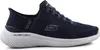 A side view of a navy blue Skechers slip-on sneaker with a white sole. Náhľad obrázku produktu