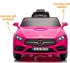 Front view of a pink toy Mercedes car with labels pointing to the headlights and taillights. Produktbild-Vorschau