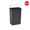 A dark gray trash can with a silver handle is shown against a white background. A red circular logo with the word "Hailo" is in the upper right corner. Voir les images du produit