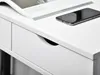 A close-up view of a white desk with a drawer and a smartphone and a magazine on top. Voir les images du produit