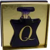 A blue glass perfume bottle with a gold 'Q' logo, presented in a gold-lined box. Voir les images du produit