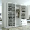 An open wardrobe with clothes and folded items on shelves and in drawers. Produktbild-Vorschau