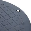 A close-up view of a black, textured circular object with a silver screw in the center. Anteprima dell’immagine prodotto