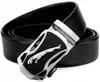 A black leather belt with a silver and black buckle featuring a jaguar emblem. Anteprima dell’immagine prodotto