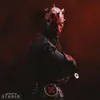 A bust of Darth Maul from Star Wars, with his iconic red and black face paint and horns. He is wearing black robes and holding a lightsaber hilt. The background is dark red and black, with dramatic lighting. Náhľad obrázku produktu