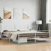 A white metal bed frame with bedding in a bedroom. Náhľad obrázku produktu