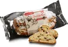 A loaf of gluten-free Christstollen with slices cut out, presented in its packaging. Produktbild-Vorschau