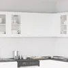A clean, modern kitchen with white upper cabinets. Anteprima dell’immagine prodotto