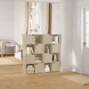 A modern living room with a wooden shelving unit filled with books and decor, near a window with cream curtains. Produktbild-Vorschau